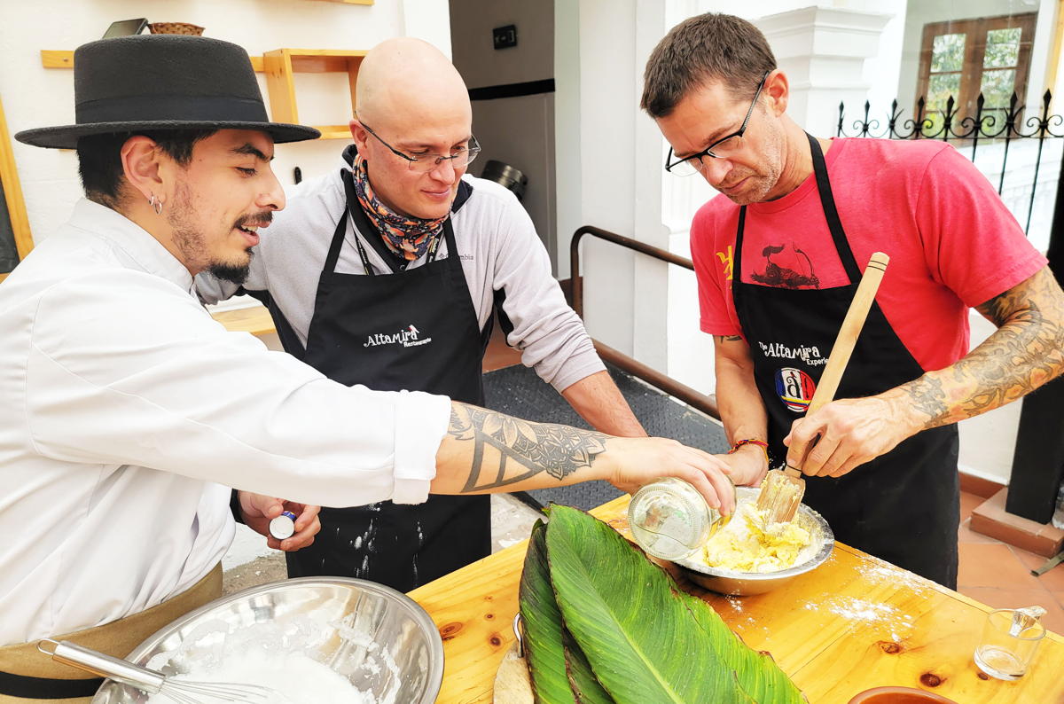  Chef Dennis Jara Pantoja (left) offers cooking classes (which include dessert!) as part of the Altamira Gastronomic Experience. Ecuador’s infamous tour guide Juan David Mantilla is centre, and photographer, Jonathan Parlee put his camera down to join in the fun. The result was a delicious quimbolito, a traditional steamed cake of Ecuador.(Jonathan Parlee)