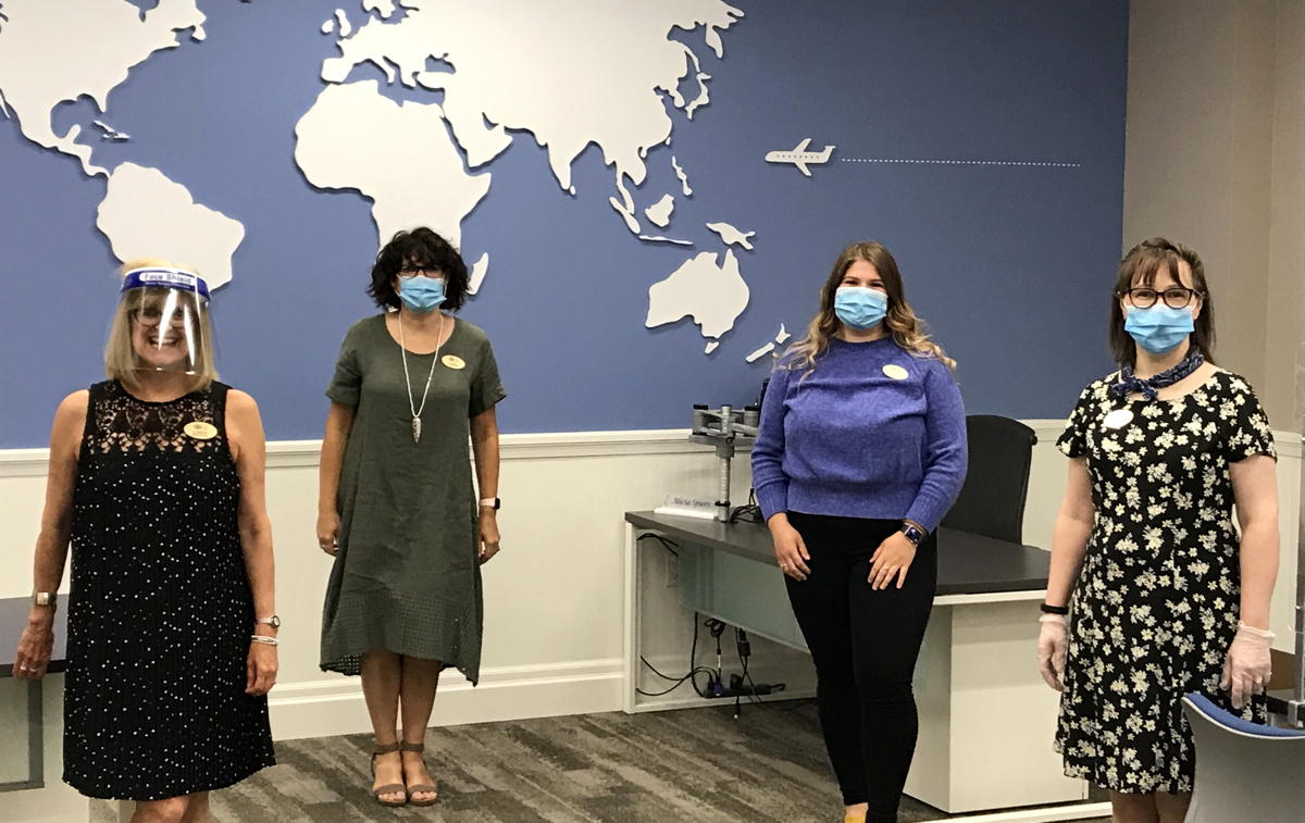 Staff get ready to greet customers at CAA's recently reopened Kingston Store. (Supplied)