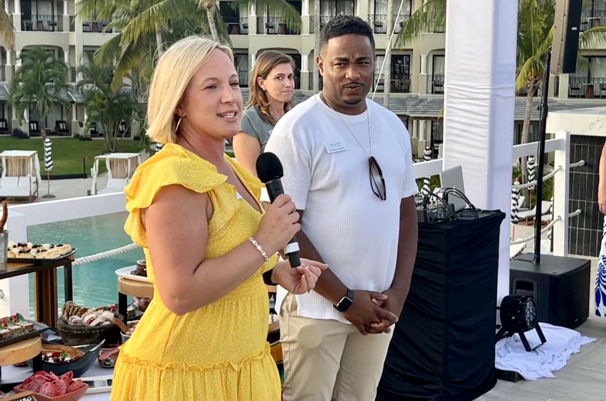 Amanda Morris, Playa’s director of sales for Canada, greets attendees at All Stars 2023. (Pax Global Media)