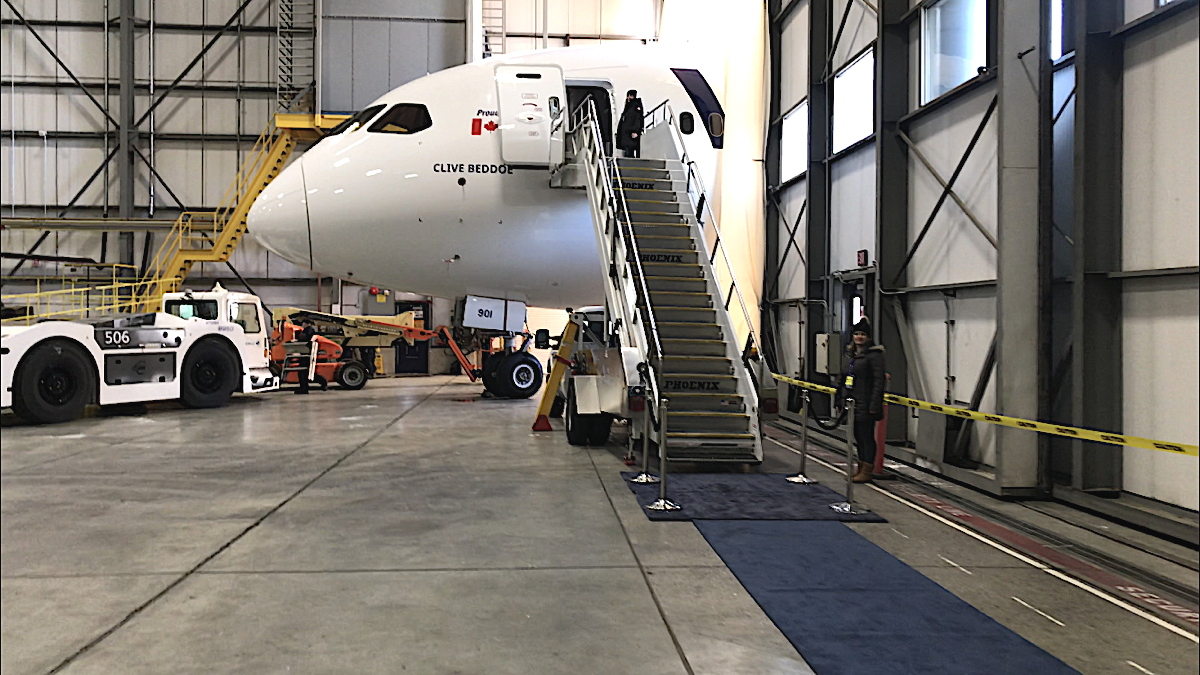 TIGHT FIT. WestJet's new 787-9 Dreamliner awaits guests in the Calgary hangar at WestJet headquarters. 