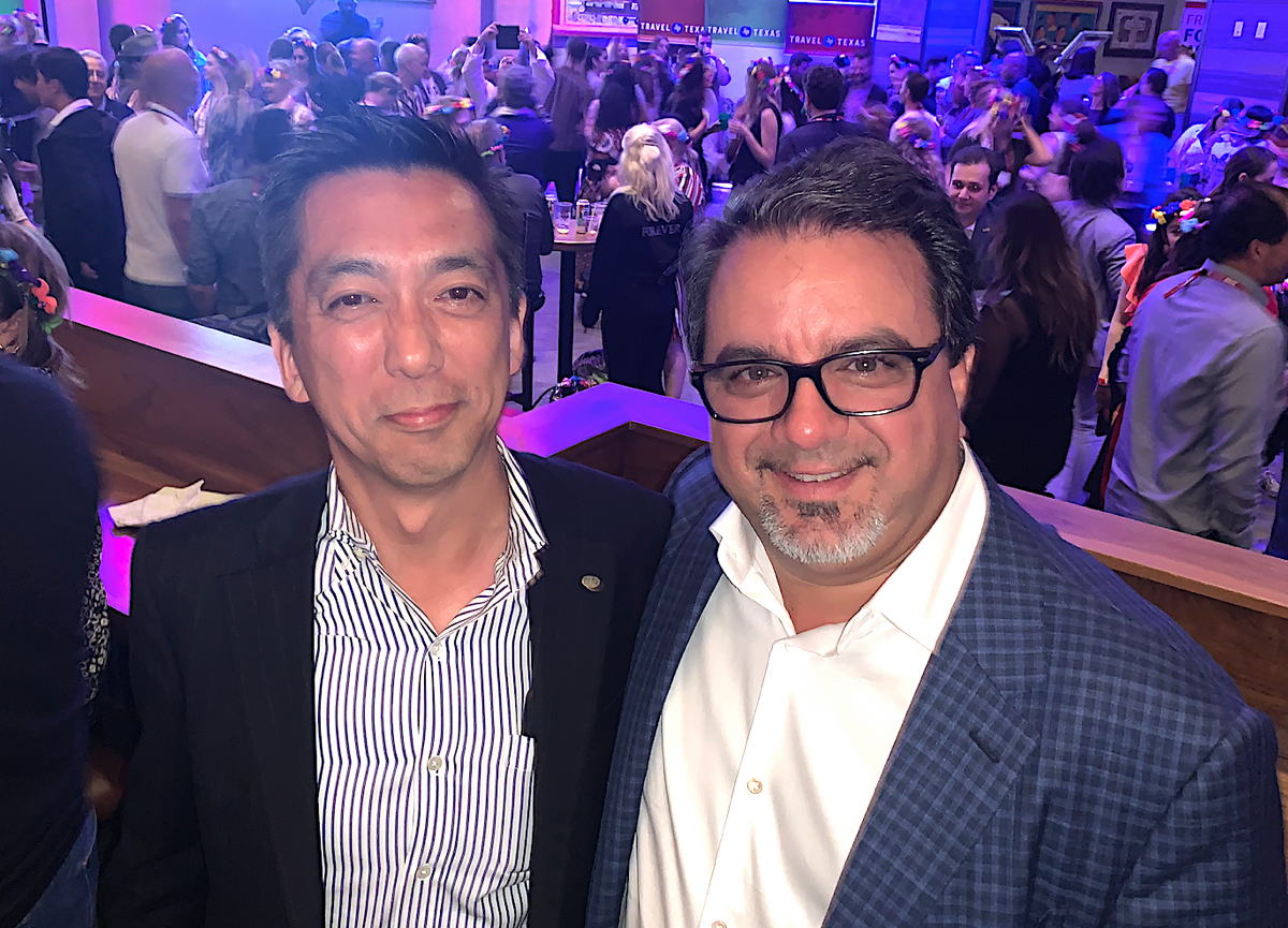 From left: Hideo Hatano, president and CEO of H.I.S. Co., Ltd.; Frank DeMarinis president and CEO of TravelBrands.