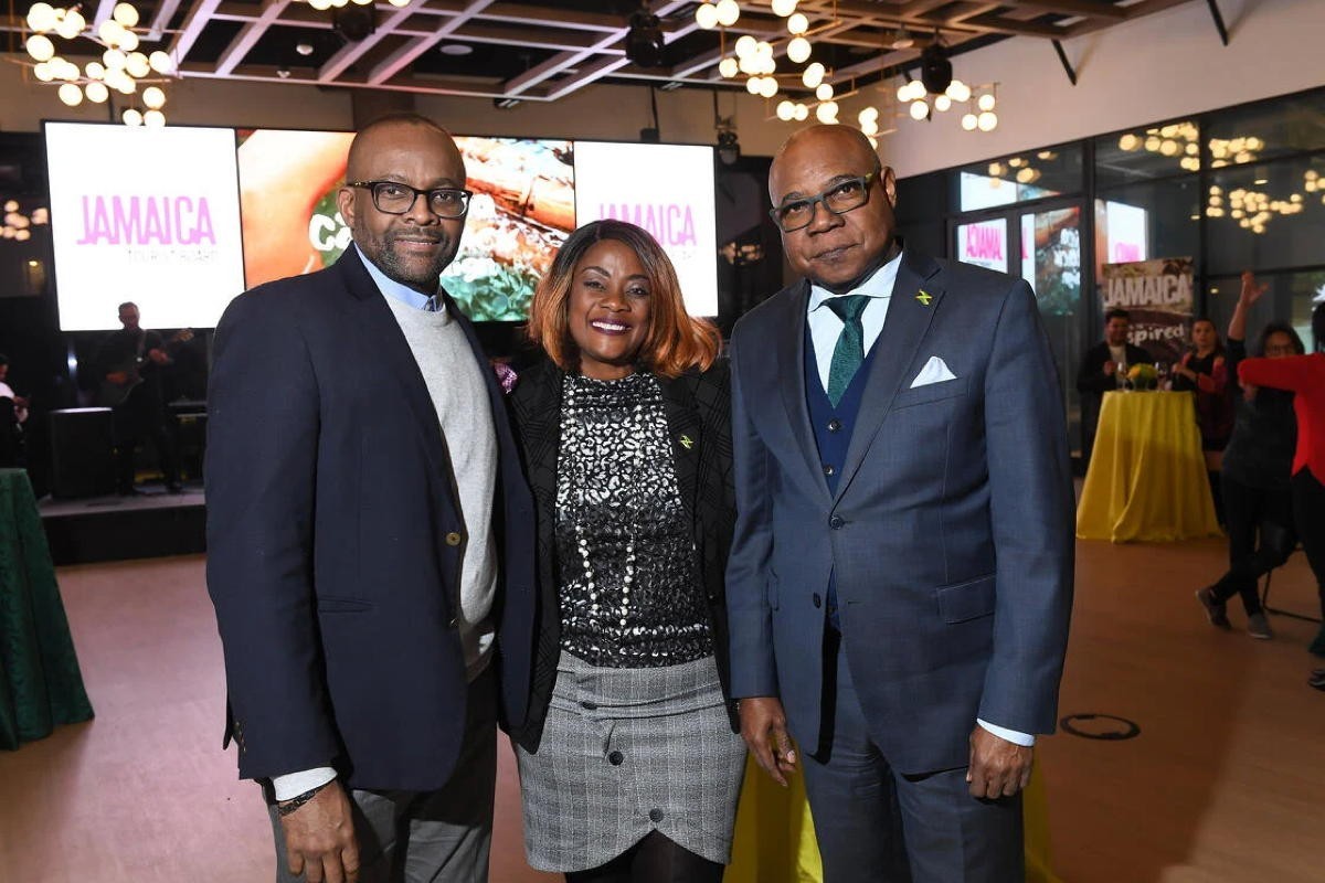 rom left (of JTB): Donovan White, Director of Tourism; Angella Bennett, Regional Director, Canada; Hon. Edmund Bartlett, Minister of Tourism, photographed in Toronto in November. (File photo/supplied)