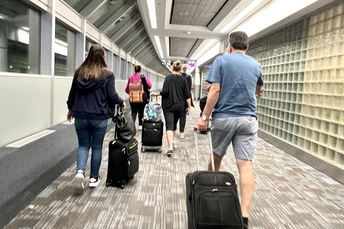 Travellers pass through Toronto Pearson airport. (Pax Global Media/file photo)