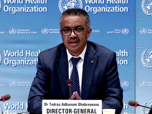 Fight COVID-19 by wearing masks, not with travel bans, says WHO