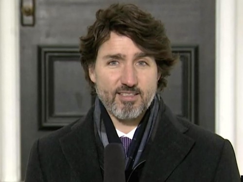 Travel restrictions will be in place for "as long as needed," says Trudeau