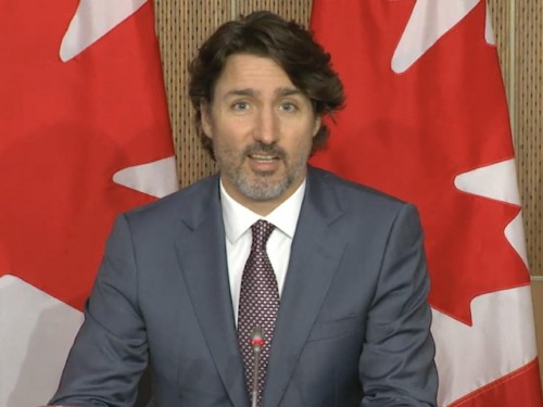 Canada will reopen U.S. border to vaxxed travellers using “phased” approach, says Trudeau