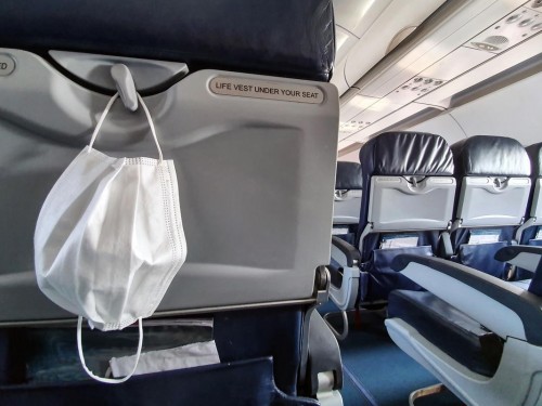 Canada will not abolish face mask requirement for flights just yet, Alghabra suggests