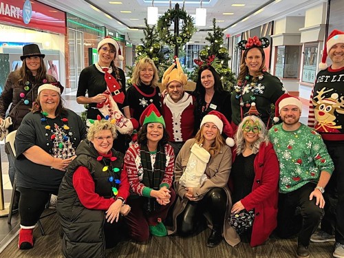 Alberta supplier caroling event serenades agencies, collects food donations