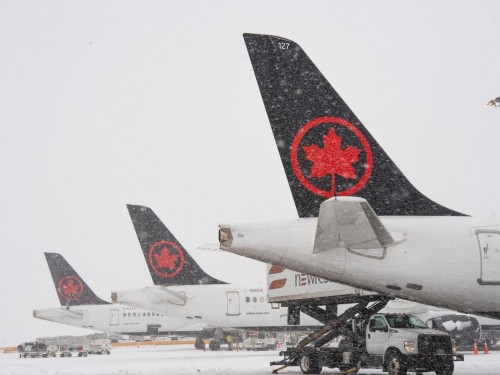 Airlines post updates as YYZ & YVR warn of operational impacts due to weather