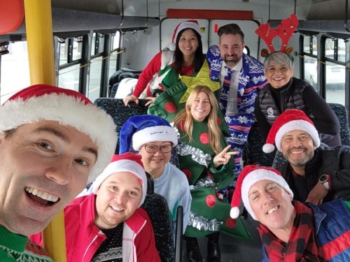 “It’s a very fun day”: B.C.-based BDMs go carolling at travel agencies, support food bank